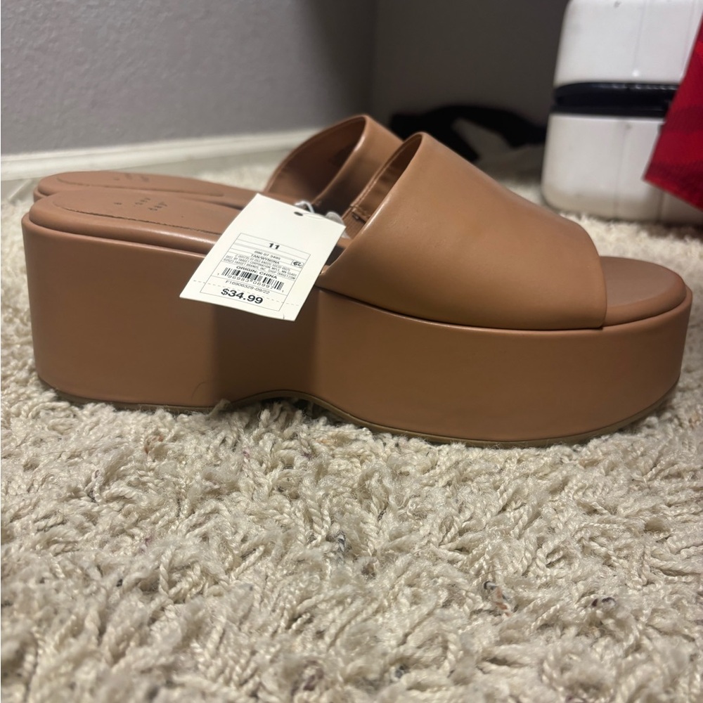 Brand new with tag. Size 11